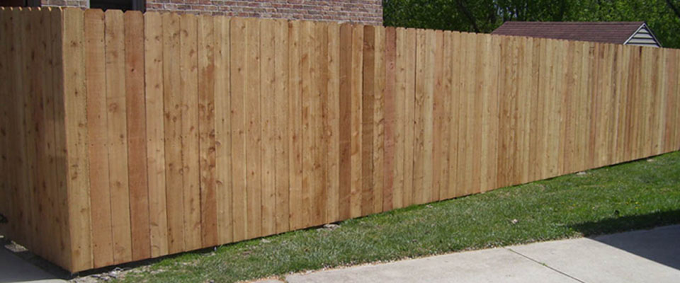 Custom built wood privacy fencing looks perfect in any landscape.